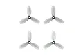Four clear grey BetaFPV 3-blade propellers arranged in a grid on a white background.