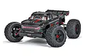 Studio shot of the ARRMA Outcast 8S EXB 1/5 scale RC stunt truck in black, featuring aggressive off-road tires and a detailed body shell.