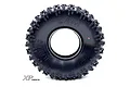 A single Reefs RC 2.2 inch Crux rock crawler tyre featuring aggressive tread patterns, black rubber construction, and a small pink dot on the sidewall.