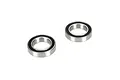 Two Losi rubber shielded ball bearings shown from an angled perspective on a white background.