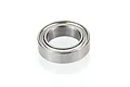 A single silver-coloured metal ball bearing isolated on a white background.