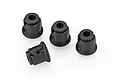 Four black plastic differential outdrive cups for Blackzon 1/16 scale RC cars arranged on a white background.
