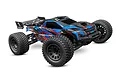 A studio shot of the Traxxas XRT Ultimate 8S RC truggy in a blue, black, and red livery, featuring large off-road tires and a rear wing.