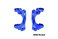 A pair of blue anodized aluminium front hub carriers for RC cars, marked with L and R, featuring the GPM Racing logo.