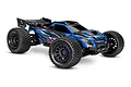 Traxxas XRT 8S 1/6 scale electric RC truggy in blue and black livery, shown from a front three-quarter angle on a white background.