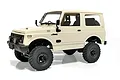 A cream-colored WPL C74 Suzuki Jimny JA11 RC rock crawler model viewed from a front three-quarter angle against a white background.