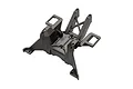 A black plastic Traxxas rear shock tower component for an RC vehicle, shown from a high-angle perspective against a white background.
