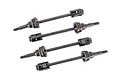 Four Traxxas steel CVD driveshafts arranged diagonally on a white background.