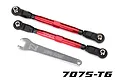 Two red Traxxas aluminium toe links with black rod ends and a silver adjustment wrench on a white background.