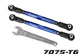 Two blue Traxxas aluminium toe links with black rod ends and a metal adjustment wrench on a white background.