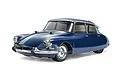 A studio shot of a Tamiya 1/10 scale Citroen DS RC car model in dark blue, featuring chrome-look bumpers and wheels against a white background.
