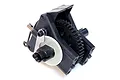 A black plastic single-speed RC gearbox assembly featuring a large spur gear, metal mounting plate, and drive cup, isolated on a white background.
