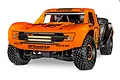 Traxxas Unlimited Desert Racer 1/7 scale RC truck in orange and black with LED light bars and BFGoodrich branding.