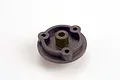 A black plastic Traxxas spur gear adapter with three mounting holes and a central cylindrical hub, isolated on a white background.