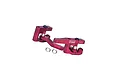 A red anodized aluminium steering bellcrank and drag link assembly for RC cars by GPM Racing, featuring metal washers and brass-coloured bushings.