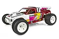 Team Associated RC10GT Classic 1/10 scale nitro stadium truck with red and white body, white wheels, and off-road tires.