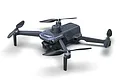 UDI RC Rage Pro FPV drone featuring a carbon fiber pattern body, four propellers, and a front-facing camera, isolated on a white background.
