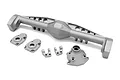 Silver aluminium rear axle housing components for a Vanquish Capra RC crawler, including the main axle tube, differential cover, and mounting brackets.
