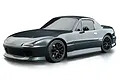 A studio shot of a grey Mazda MX-5 RC drift car body shell on a white background.