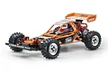 A studio shot of the Kyosho Javelin 1/10 scale 4WD electric RC buggy, featuring an orange tubular roll cage frame and black off-road tires.