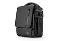 A black DJI Mavic 2 shoulder bag with a top handle, front flap, and side mesh pocket, set against a plain white background.