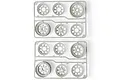 Two plastic sprues containing a total of 12 white RC car rims in various sizes, viewed from above against a white background.