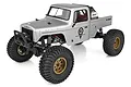 A studio shot of the Element RC Enduro Ecto 1/10 scale RC rock crawler in grey, featuring large off-road tires and gold-colored wheels.