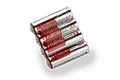 A pack of four Fujitsu AA Universal Power alkaline batteries wrapped in clear plastic on a white background.
