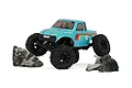 RGT Ripper 1/18 scale RC rock crawler in light blue with red and yellow racing stripes, driving over two grey rocks against a white background.