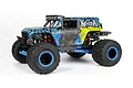 HPI Mini-King Flux Big Kahuna 4400 RC monster truck with blue and green floral livery, large black off-road tires, and blue beadlock wheels.