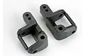 A pair of black plastic Traxxas 30-degree caster blocks for RC vehicles, shown from an overhead angle against a white background.