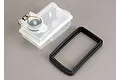 Traxxas 75cc fuel tank with a spring-loaded cap and a separate rectangular black rubber dampener on a grey background.