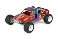 A studio shot of a Team Associated RC10T RC stadium truck with a red, blue, and pink painted body, white wheels, and knobby off-road tires.