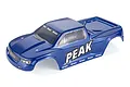 A blue pre-painted RC stadium truck body shell by Atrek, featuring 'PEAK' branding on the side and Atrek logos on the windshield and lower panels.