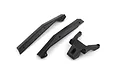 A set of black plastic RC car spare parts including two side guards and one bulkhead component on a white background.