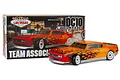 Team Associated DC10 Classic 1/10 scale RC drift car kit with its box, featuring an orange and red flame-patterned body shell.