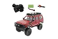 WPL C54-1 1/16 scale red RC rock crawler truck with transmitter, battery, and USB charger on a white background.