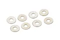 Eight small, flat, circular steel washers arranged in a scattered pattern on a white background.