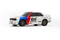 A 1/64 scale HPI Nano-TTR 1987 BMW M3 RC car in Warsteiner livery, featuring white body with blue and red racing stripes, gold wheels, and number 40 decals.