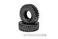 Two JConcepts 2.2 inch The Hold crawler tyres stacked on a white background.