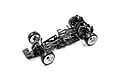Onisiki Nekomata 1/24 scale RWD RC drift car chassis kit in black with white wheels, viewed from a high angle against a white background.