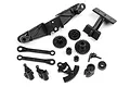 A set of black plastic RC spare parts for the HPI Q32, including gears, suspension arms, and steering components, laid out on a white background.