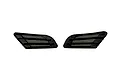 Two black plastic fender duct accessories for 1/10 scale RC car bodies, featuring a mesh grille design.