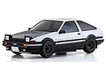 Kyosho Mini-Z MA-020 Toyota Sprinter Trueno AE86 RC drift car in white and black with pop-up headlights, studio shot on white background.