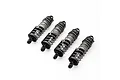 Four Pro-Line PowerStroke adjustable RC shock absorbers with black bodies and grey springs arranged on a white background.