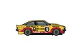 Side profile of a yellow and red Scalextric 1/32 scale Holden A9X Torana slot car, race number 19, featuring various sponsor decals.