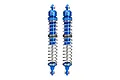 Two blue GPM Racing aluminium adjustable double spring RC shock absorbers standing vertically against a white background.