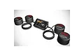 SkyRC TWneo tyre warmer system with a central control unit and four black heating cups connected by cables, displayed on a white background.