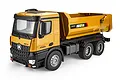 A studio shot of a yellow and black HuiNa 1582 diecast RC dump truck on a white background.