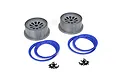 Two grey RC wheel rims, four blue beadlock rings, and two sets of small black mounting screws on a white background.